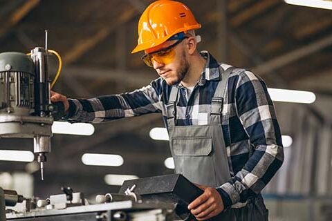 A worker on site complying to the work place safety rules